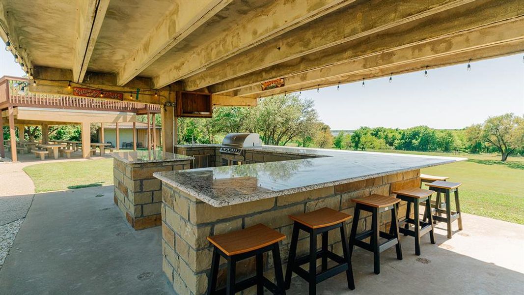 View of patio / terrace featuring exterior kitchen