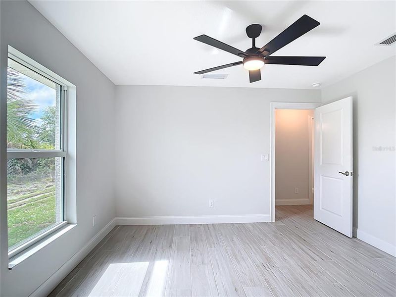 Spacious, unfurnished interior of a new home in , Port Charlotte (Image 20).