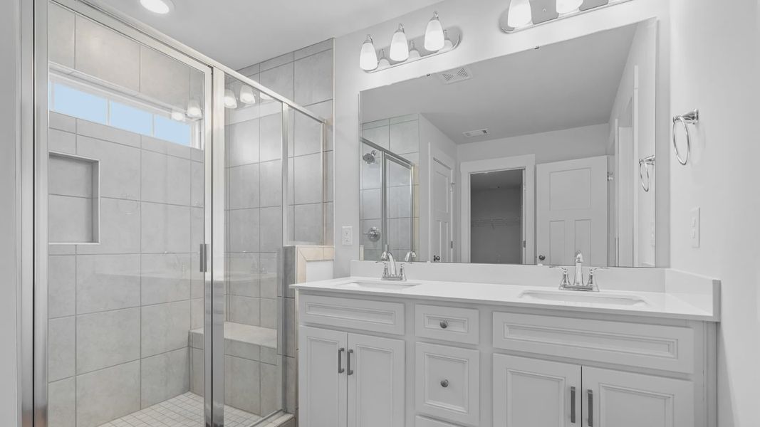 2 story single family home, all white, owner's bath