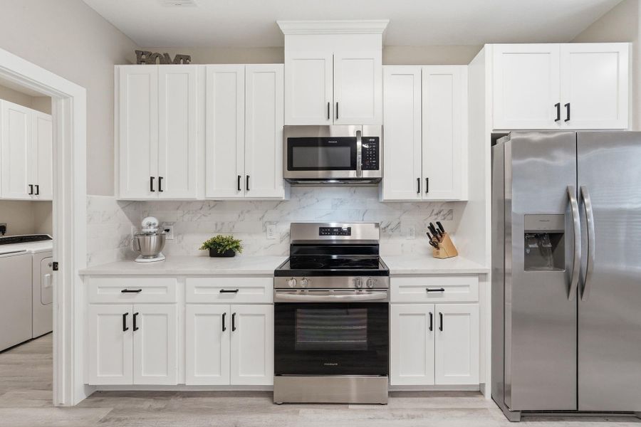 Furnished interior view inside a new home in , Conroe (Image 11).
