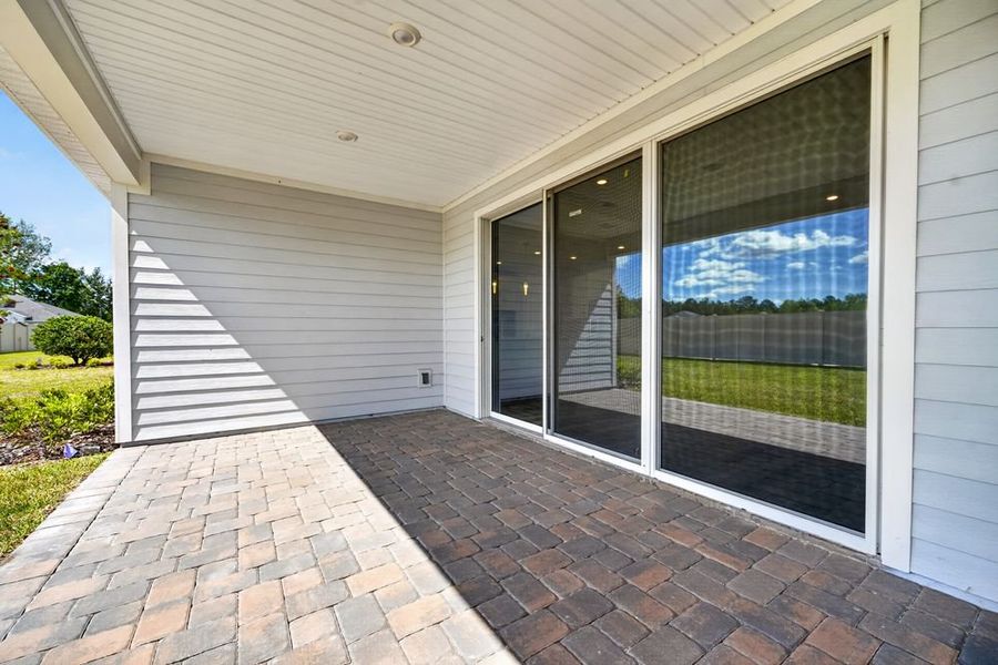 Exterior details and patio area of a home in Headwaters at Lofton Creek, Yulee (Image 4).