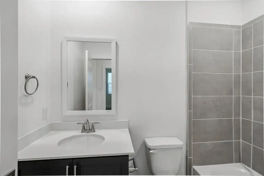 Furnished interior view inside a new home in Rose Hill, San Antonio (Image 16).