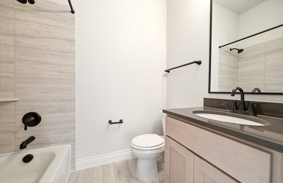 Furnished interior view inside a new home in Bridgeland 60′, Cypress (Image 15).