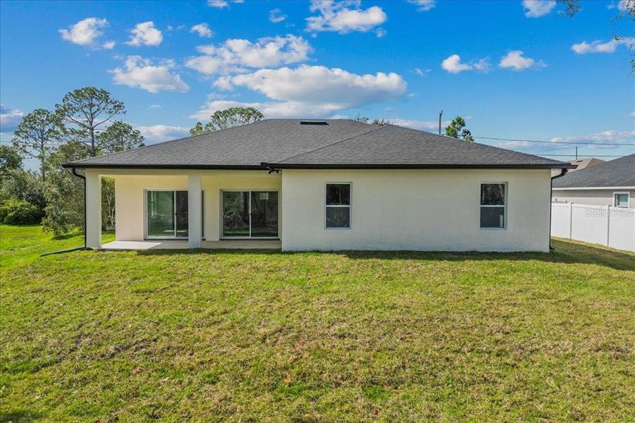 Exterior details and patio area of a home in , Deltona (Image 22).