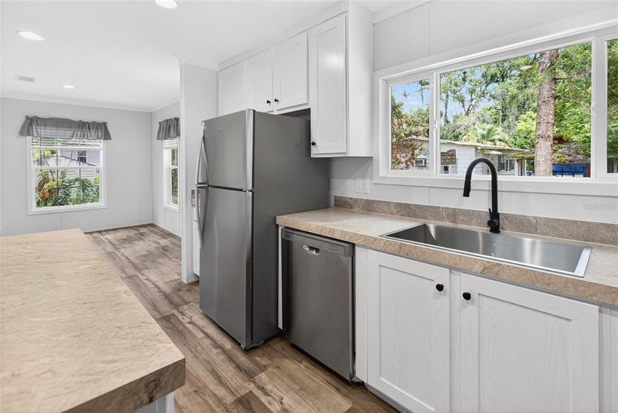 Furnished interior view inside a new home in , Brooksville (Image 9).