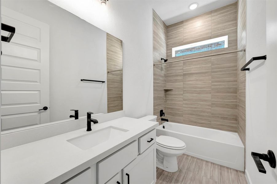 Furnished interior view inside a new home in Heritage, Dripping Springs (Image 9).