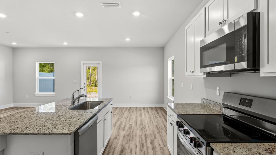 Furnished interior view inside a new home in Chateau Nemours, Port Saint Joe (Image 9).