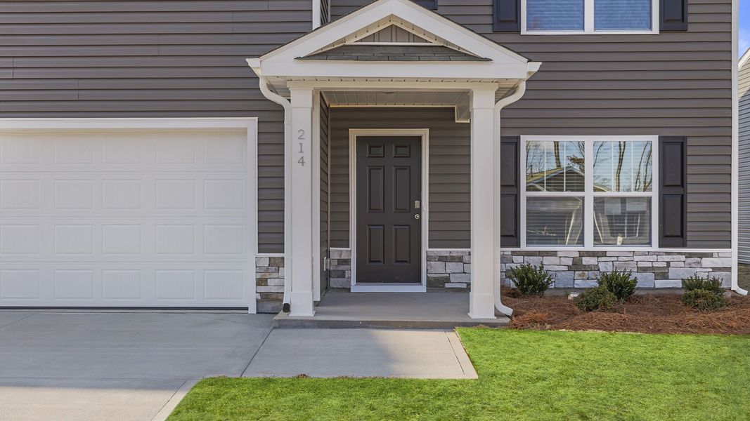 Exterior details and patio area of a home in Bentley Park, Greenwood (Image 2). Exterior details and patio area of a home in Bentley Park, Greenwood (Image 2).