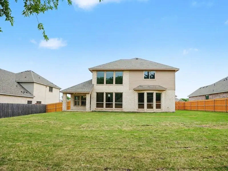 Exterior details and patio area of a home in Cole Crossing Estates, DeSoto (Image 4).