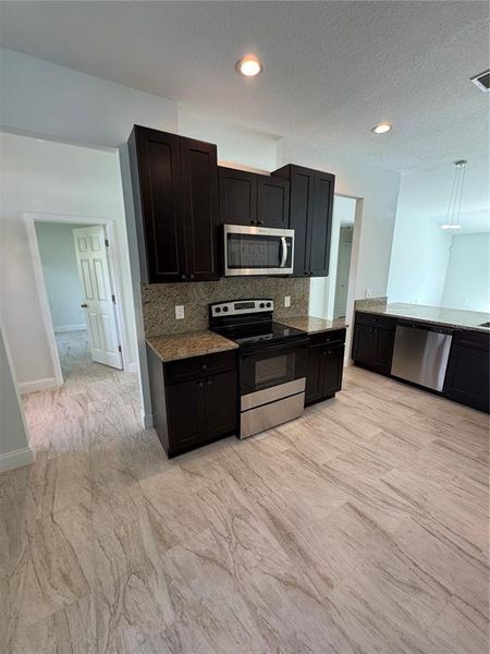 Furnished interior view inside a new home in , Deltona (Image 7).