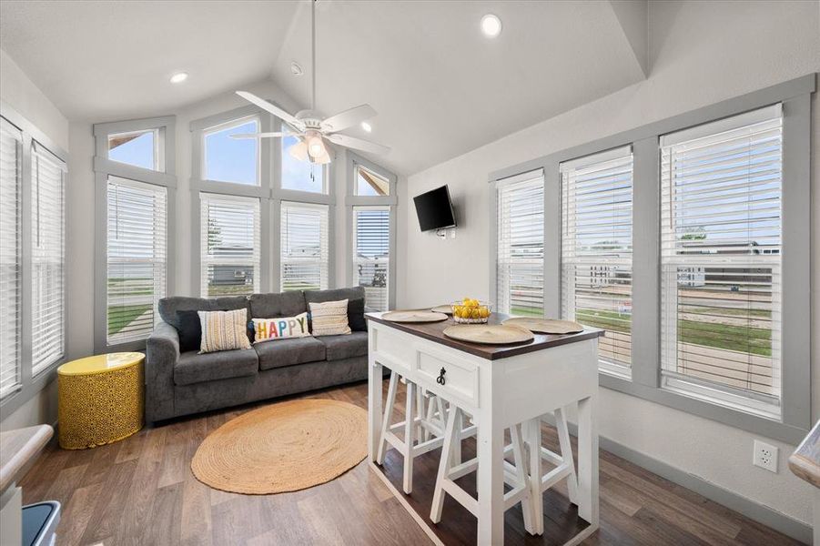 Lots of windows let the outside in creating a bright and sunny space!