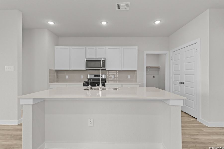 Furnished interior view inside a new home in Mesa Vista, San Antonio (Image 9).