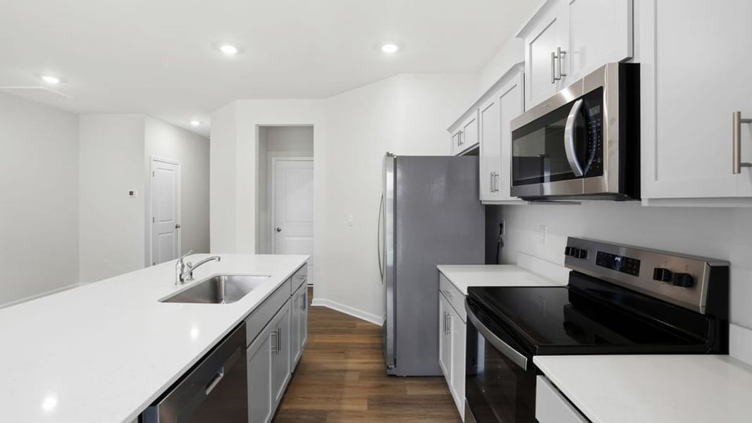 Furnished interior view inside a new home in Tanglewood Townes, Greenville (Image 12).