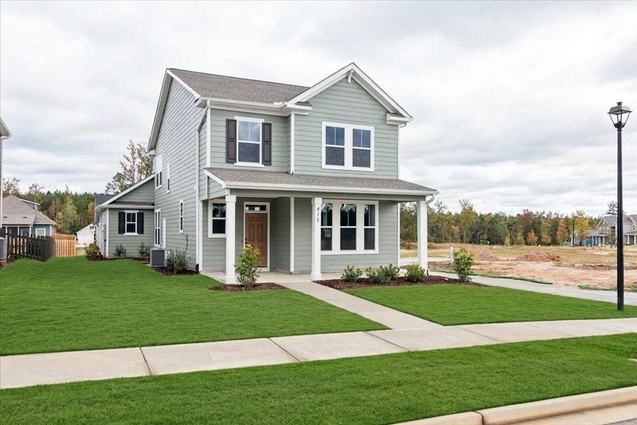 Front exterior of a new home in Tillery Park, Grovetown, GA, highlighting curb appeal (Image 21). Front exterior of a new home in Tillery Park, Grovetown, GA, highlighting curb appeal (Image 21).