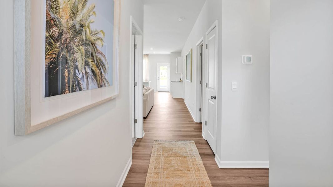Representative unfurnished interior of a home built from the LEWIS by D.R. Horton in The Cottages at Blake Farm, Wilmington (Image 8).