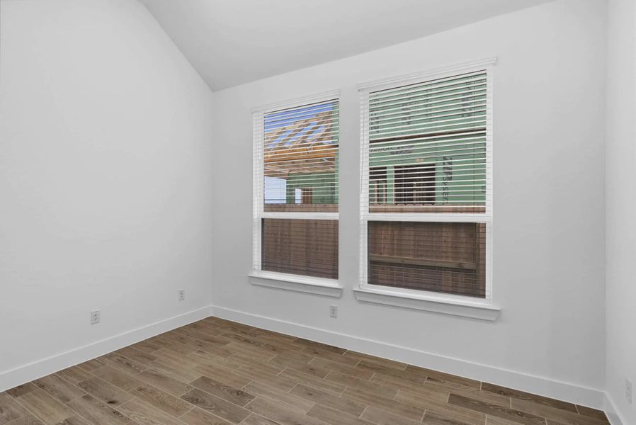 Representative unfurnished interior of a home built from the Summerton by Chesmar Homes in Beacon Point, Texas City (Image 24).