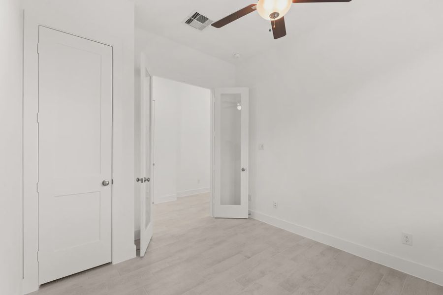 Representative unfurnished interior of a home built from the Mickelson by Chesmar Homes in Riceland Alley Loads, Mont Belvieu (Image 100).