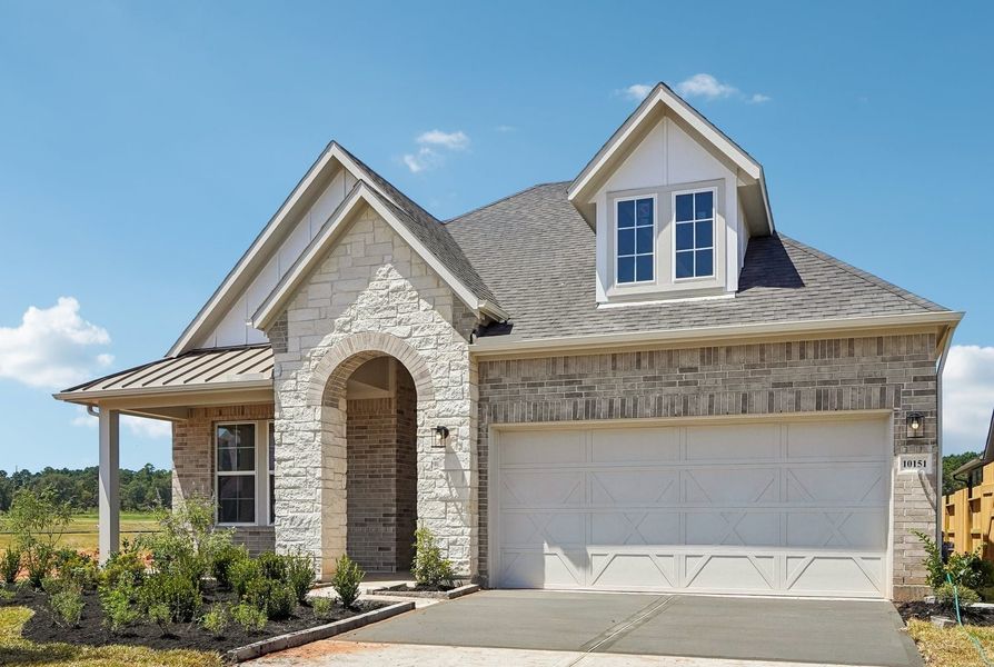 Front exterior of a new home in Copia Pines, Montgomery, TX, highlighting curb appeal (Image 1). Front exterior of a new home in Copia Pines, Montgomery, TX, highlighting curb appeal (Image 1).