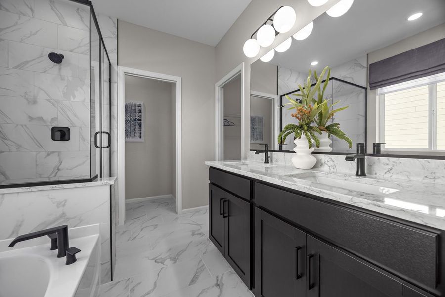 Dual-sink vanity at primary bathroom