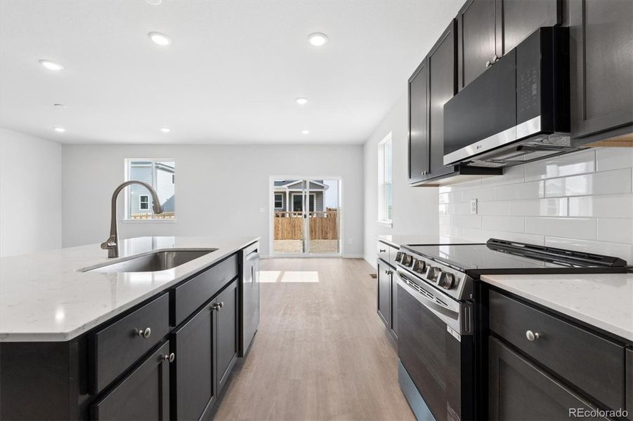 Furnished interior view inside a new home in Sweetgrass, Dacono (Image 6).