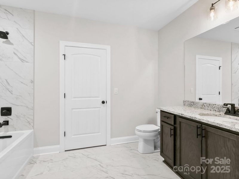 Furnished interior view inside a new home in , Black Mountain (Image 9).