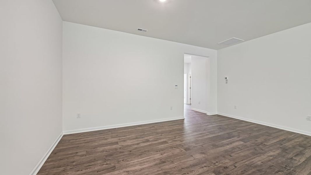 Spacious, unfurnished interior of a new home in The Villas at Laurel Oaks, Sanford (Image 10).