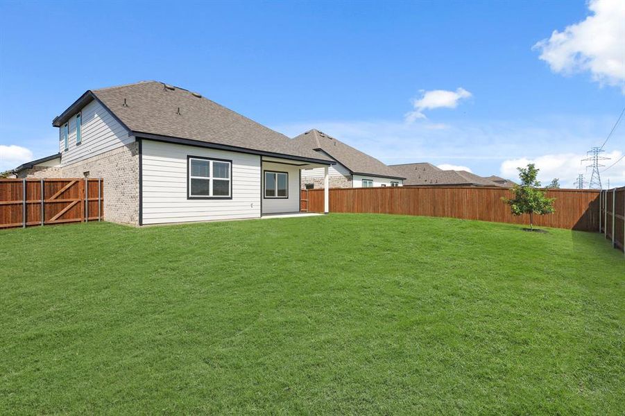 Front exterior of a new home in Burgess Meadows, Cleburne, TX, highlighting curb appeal (Image 12).