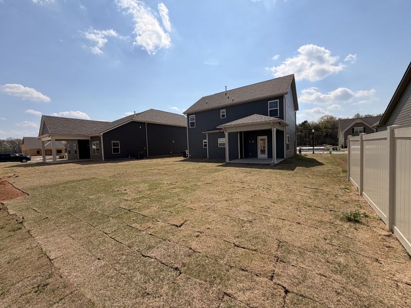 Flat, spacious backyard with a covered back porch for you to enjoy! Flat, spacious backyard with a covered back porch for you to enjoy!