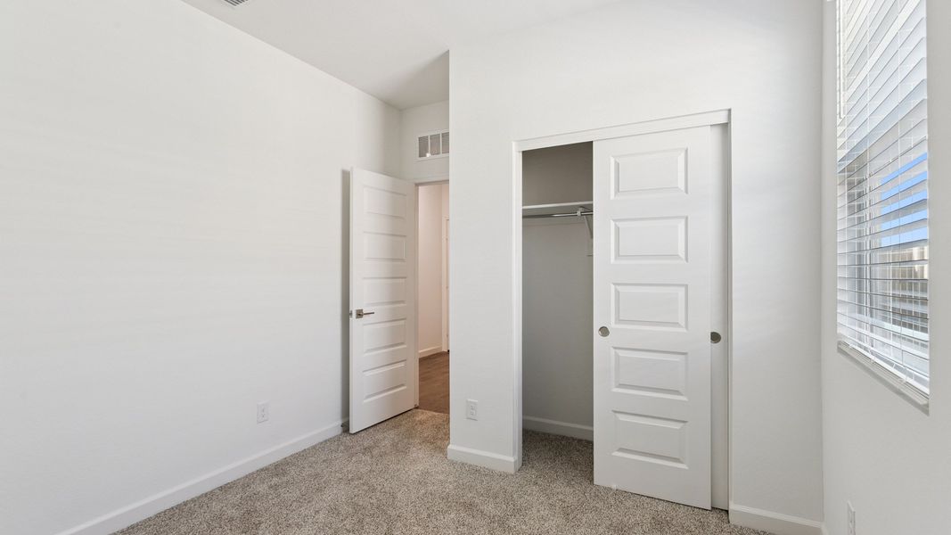 Spacious, unfurnished interior of a new home in Elena Trails, Maricopa (Image 27).