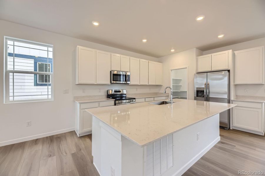 Furnished interior view inside a new home in Sterling Ranch: The Skyline Collection, Littleton (Image 7).