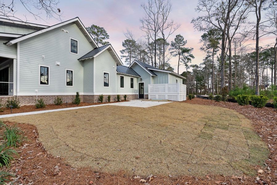 Exterior details and patio area of a home in , Ravenel (Image 2).