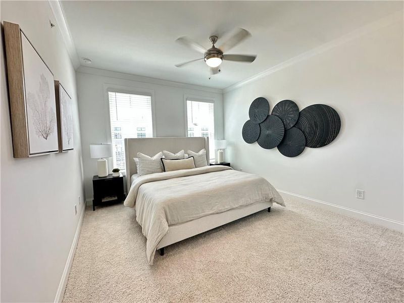 Owners Bedroom features walk in closet with private full bathroom *Photos Showcase Warm Wheat Design Collection from a different Staged Model Home Site*