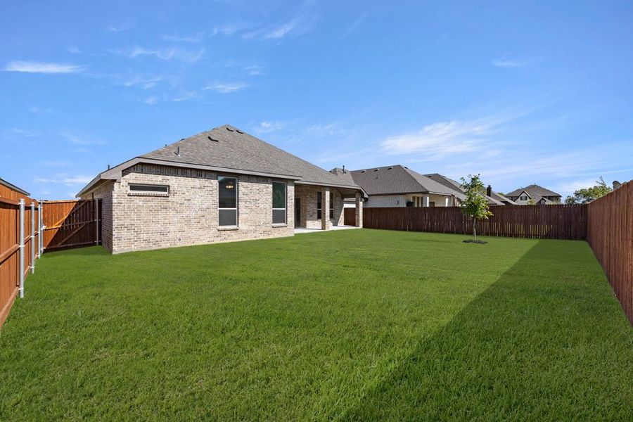 Representative exterior photo of a completed home built from the Cromwell by Impression Homes in Still Water Lake, Godley, TX (Image 24).