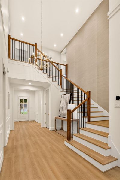 The custom staircase combines timeless craftsmanship with contemporary elegance, creating a stunning architectural feature within the home. The custom staircase combines timeless craftsmanship with contemporary elegance, creating a stunning architectural feature within the home.