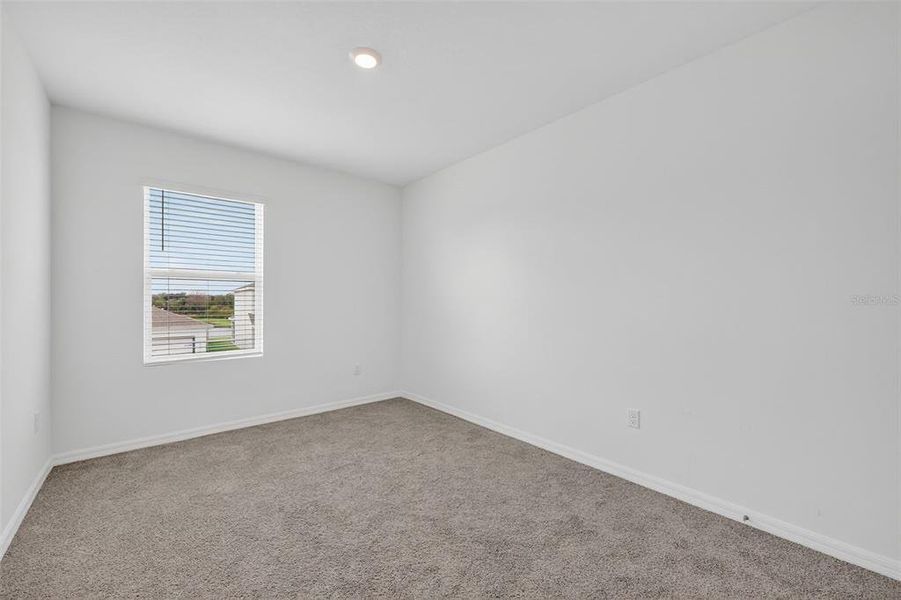 Spacious, unfurnished interior of a new home in Farm at Varrea, Plant City (Image 26).