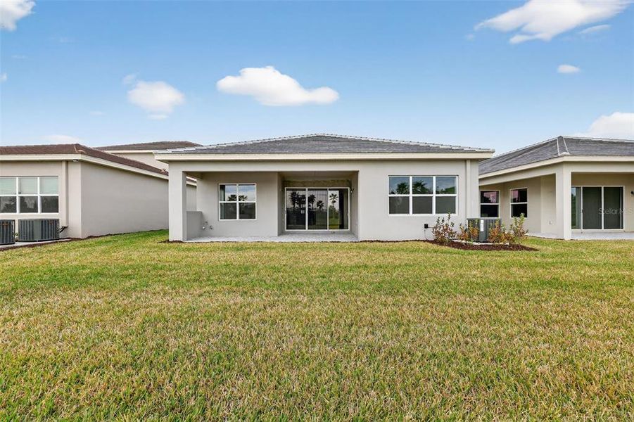Exterior details and patio area of a home in Winding Ridge, Wesley Chapel (Image 22).