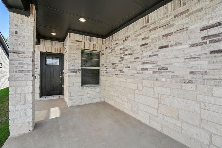 Exterior details and patio area of a home in Eastridge - Spring Series, McKinney (Image 19). Exterior details and patio area of a home in Eastridge - Spring Series, McKinney (Image 19).