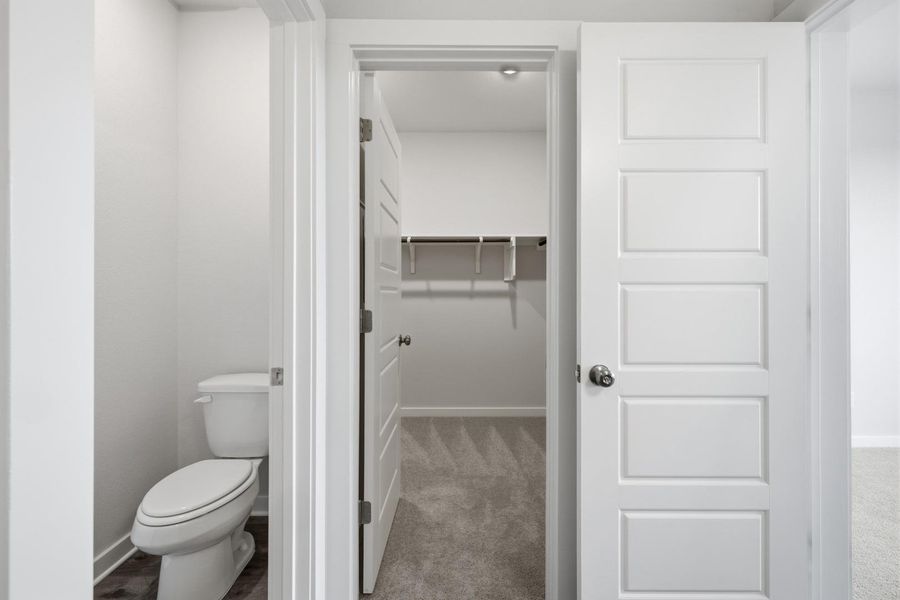 Furnished interior view inside a new home in Stallion Run, Buda (Image 16).