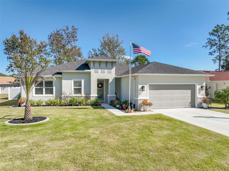 Front exterior of a new home in , Palm Coast, FL, highlighting curb appeal (Image 2).