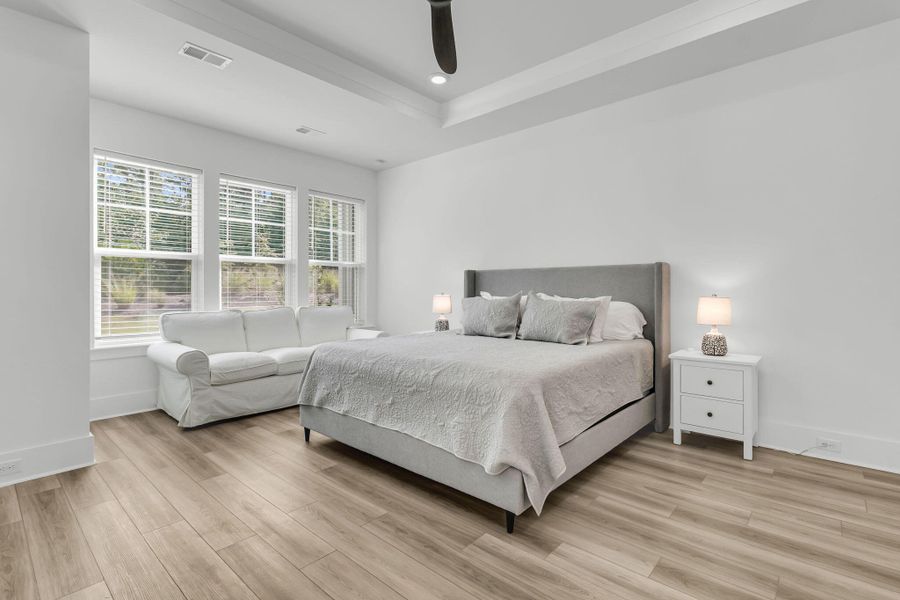Furnished interior view inside a new home in Summerwind Crossing at Lakes of Cane Bay, Summerville (Image 12).