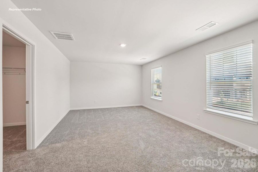 Spacious, unfurnished interior of a new home in Reedy Creek Preserve, Charlotte (Image 30).