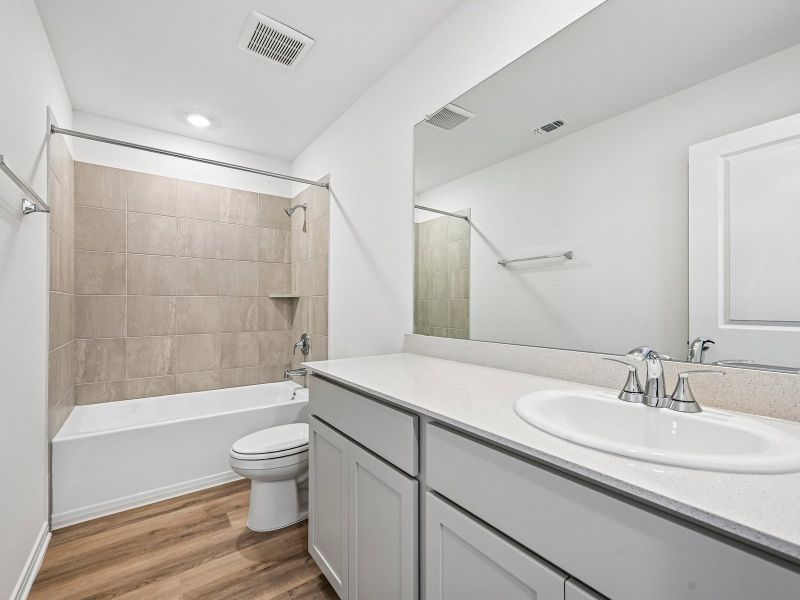 Furnished interior view inside a new home in Prairie Winds - Reserve Collection, Hutto (Image 8).