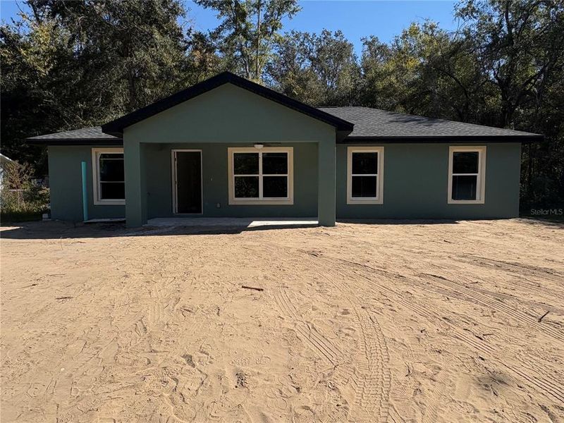 Front exterior of a new home in , Ocala, FL, highlighting curb appeal (Image 1).