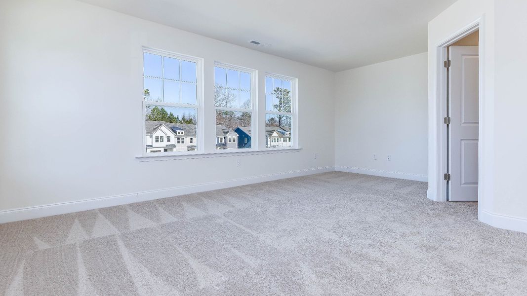 Furnished interior view inside a new home in Battle Bridge, Raleigh (Image 25).