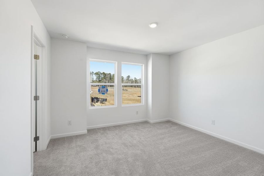 Representative unfurnished interior of a home built from the Norcross by Taylor Morrison in Windance Lake, Loganville (Image 22).