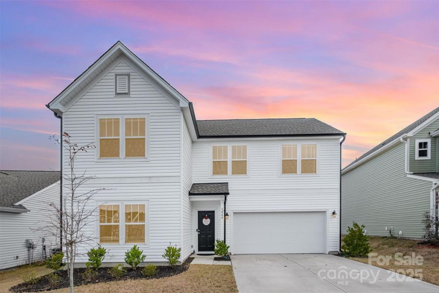 Front exterior of a new home in , Mount Holly, NC, highlighting curb appeal (Image 2).