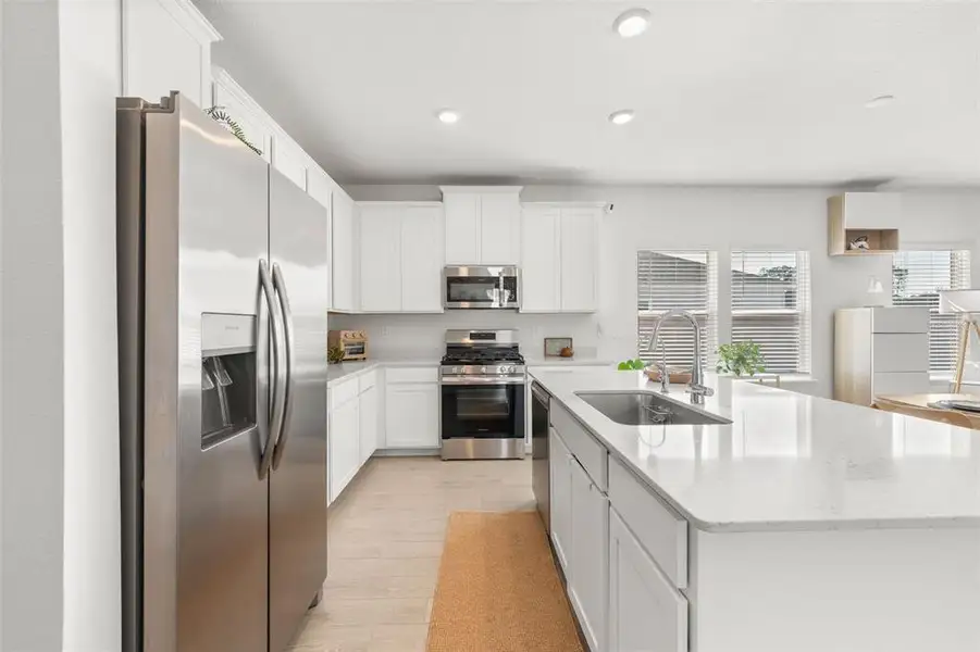Furnished interior view inside a new home in Country Lane Estates, Williston (Image 14).