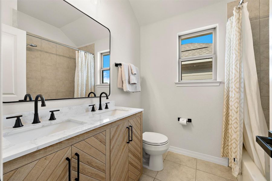 Full guest bathroom on the 2nd floor with an updated vanity, hardware and lighting