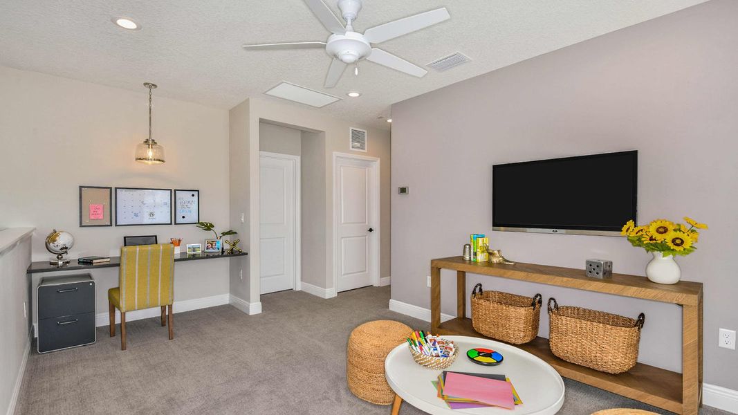Furnished interior view inside a new home in Grand Park Real Estate and Homes for Sale in Sarasota, FL - Neal Communities, Sarasota (Image 5).