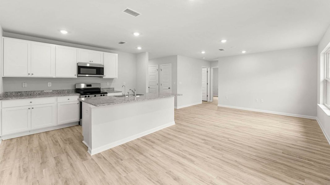 Furnished interior view inside a new home in Palmetto Bluff, Port Saint Joe (Image 10). Furnished interior view inside a new home in Palmetto Bluff, Port Saint Joe (Image 10).